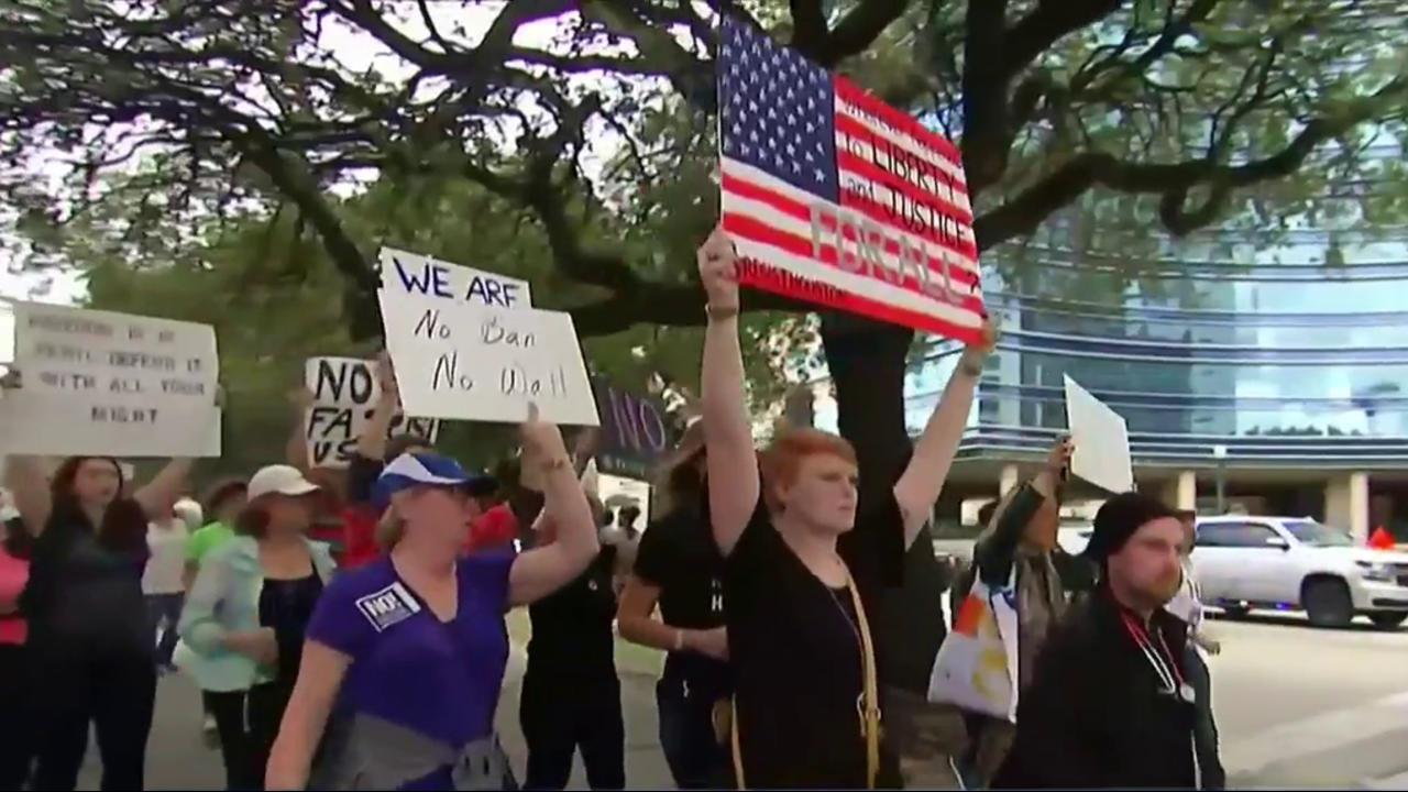 Fans, Protesters Flock to Houston for Super Bowl LI, Presenting Test for Law Enforcement