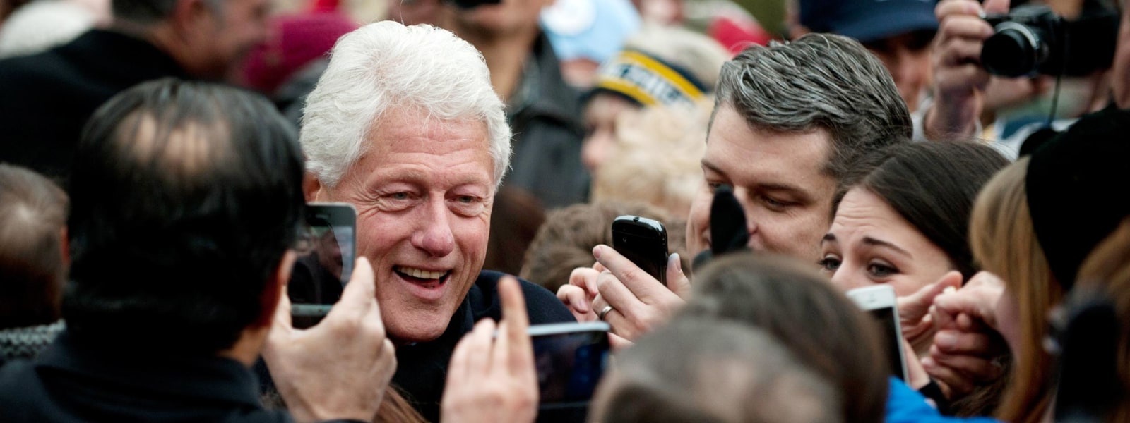 Image: Former President Bill Clinton greets supporters 