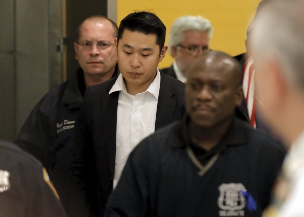 Image: New York City Police officer (NYPD) Peter Liang is led from the court room at the Brooklyn Supreme court in the Brooklyn borough of New York