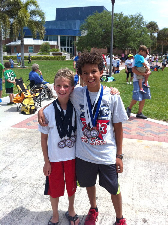 Florida swimmer Josh Zuchowski, 9, (at left) gave his trophy as the top swimmer in a meet earlier this month to rival Reese Branzell, 10, (at right) after Branzell had been hospitalized and could not compete. 