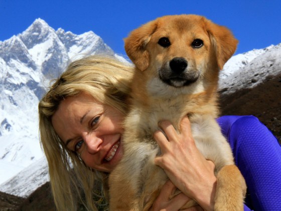 Image: Joanne Lefson and Rupee the dog on Mount Everest