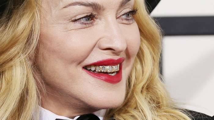 2D11438128-today-madonna-gold-grills-140