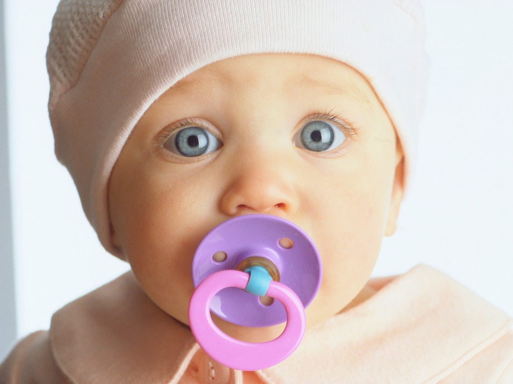 Why it may be OK to spit-clean your baby's binkie