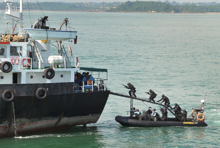 Image: Indonesian naval forces storm the "hijacked" MT Promise in May 2012