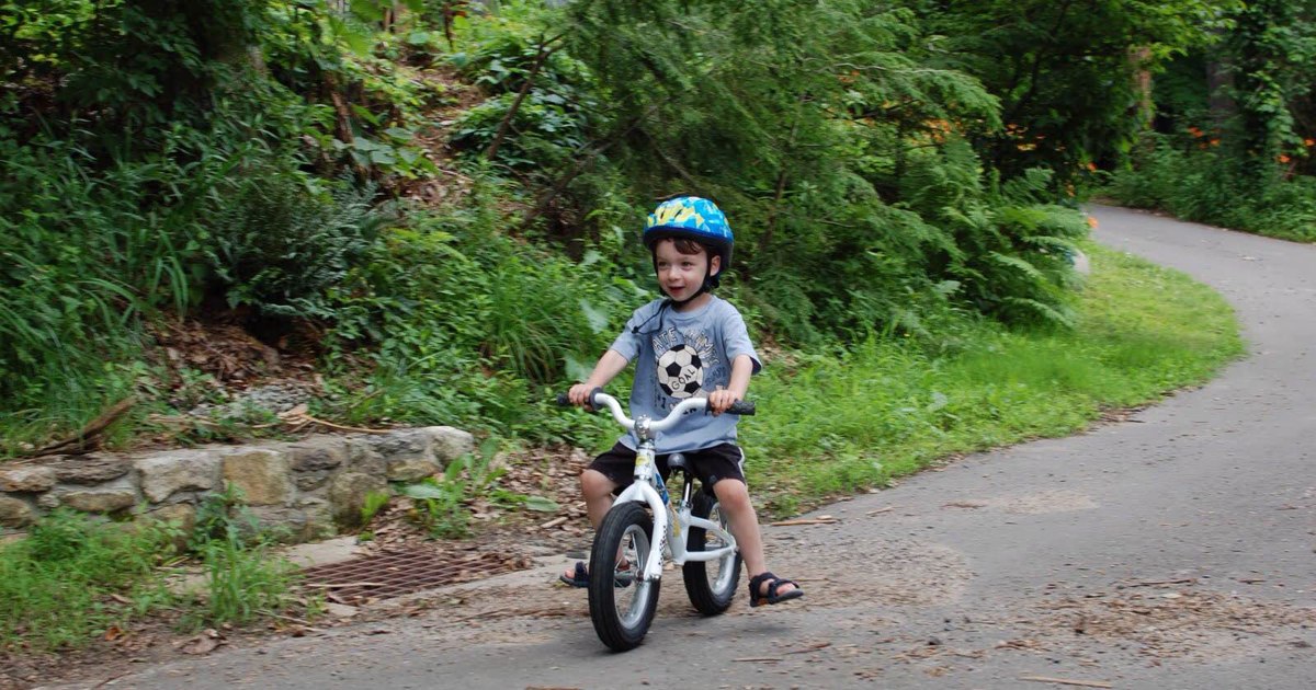 4 year old riding bike without training wheels