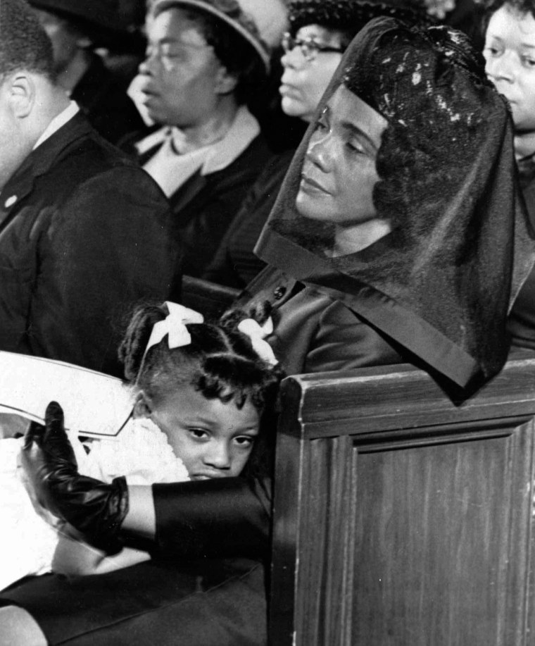 Image: Coretta Scott King and her daughter, Bernice, attend the funeral of her husband