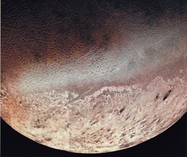 P-34764 Voyager 2 obtained this high resolution color image of Neptune's large satellite Triton during its close flyby. Approximately a dozen individual images were combined to produce this comprehensive view of the Neptune-facing hemisphere of Triton. Fine detail is provided by high resolution, clear-filter images, with color information added from lower resolution frames. The large south polar cap at the bottom of the image is highly refective and slightly pink in color , and may consist of a slowly evaporating layer of nitrogen ice deposited during the previous winter. From the ragged edge of the polar cap northward the satellite's face is generously darker and redder in color. This coloring may be produced by the action of ultraviolet light and magnetospheric radiation upon methane in the atmosphere and surface. Running across this darker region , approximately parallel to the edge of the polar cap, is a band of brighter white material that is almost bluish in color. The underlying topography in this bright band is similiar, however to that in the darker, redder regions surrounding it.
