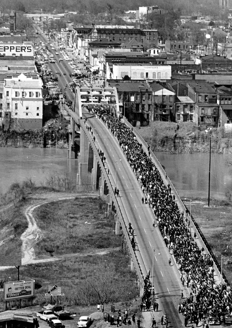 Image: Martin Luther King Jr. leads civil rights demonstrators cross the Alabama River