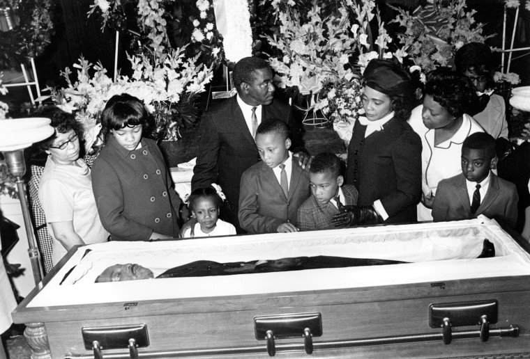 Image: Coretta Scott King, and her four children view the body of her husband