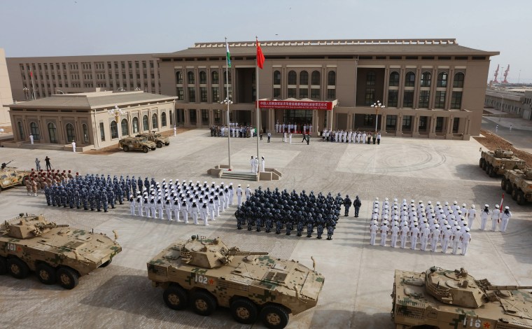 Image: Chinese People's Liberation Army personnel attend the opening ceremony of China's new military base in Djibouti