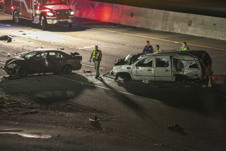Image: California Highway Patrol officers investigate the scene of a multi-car crash on Interstate 880 in Fremont, Calif.
