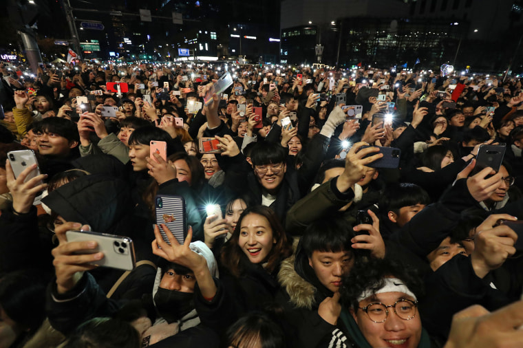 Revellers gather to celebrate the new year at the Bosingak pavilion on Jan. 1, 2020 in Seoul, South Korea.