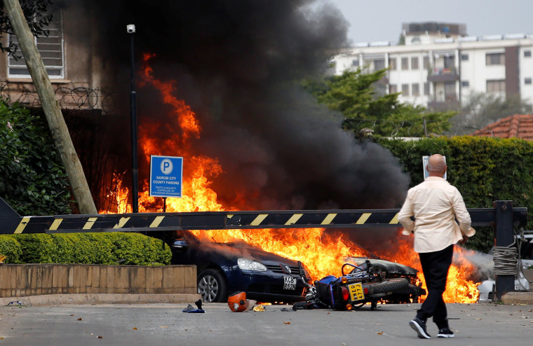 Image: Cars on fire at the Dusit hotel compound where explosions and gunshots were heard
