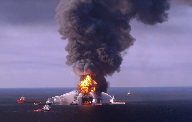 Image: Fire boat response crews as they battle the blazing remnants of the off shore oil rig Deepwater Horizon