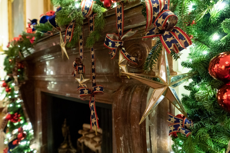 Star-spangled ornaments hang in the East Room of the White House.
