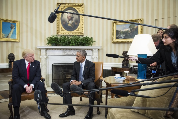 President Barack Obama talks with President-elect Donald Trump in the Oval Office