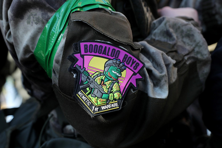 Image: A patch with the image of an armed Pepe the Frog is worn by an attendee during a rally organized by The Virginia Citizens Defense League on Capitol Square near the state capitol building Jan. 20, 2020 in Richmond, Virginia.