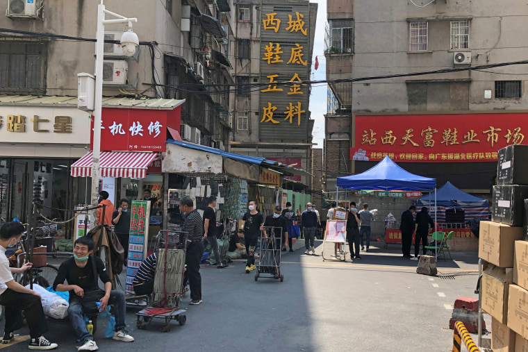 Temporary temperature checkpoint is seen behind the once bustling markets of Guangzhou's Sanyuanli area, as the spread of the novel coronavirus disease (COVID-19) continues in the country