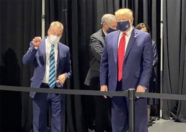 Trump wears mask with presidential seal during part of Ford plant tour