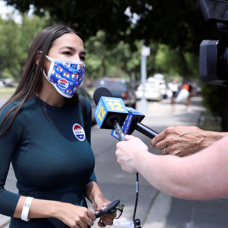 Image: U.S. Rep. AOC votes early in Democratic congressional primary election in New York City