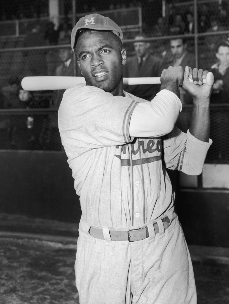 Montreal Royals baseball player Jackie Robinson holds his bat circa 1946.