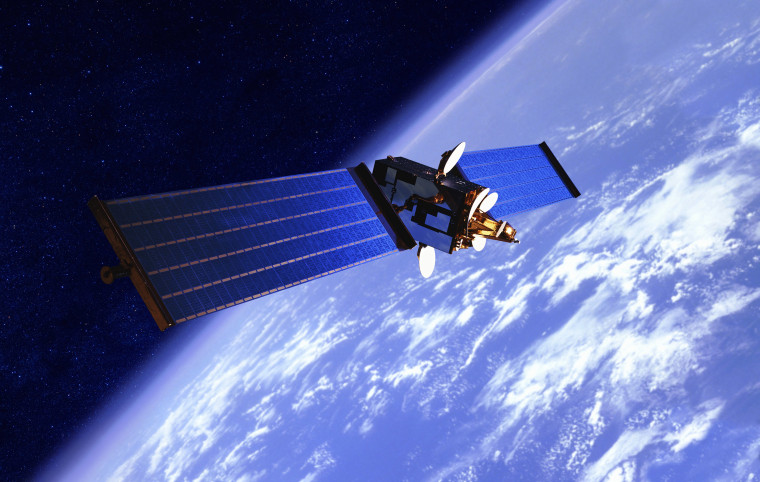 Image: A communication satellite orbits Earth.