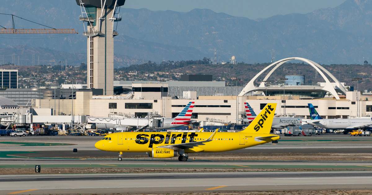 Spirit Airlines flight diverted after passenger tried to open the exit door