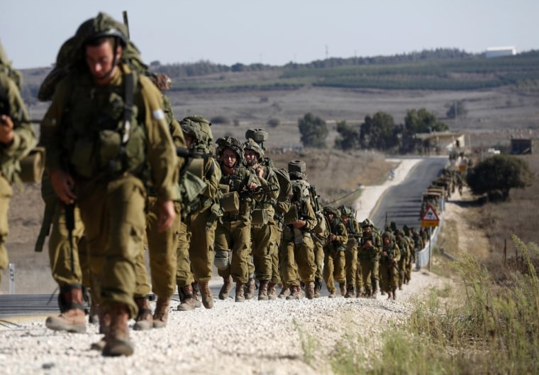 Israel eyes Syria warily from border buffer zone in Golan Heights